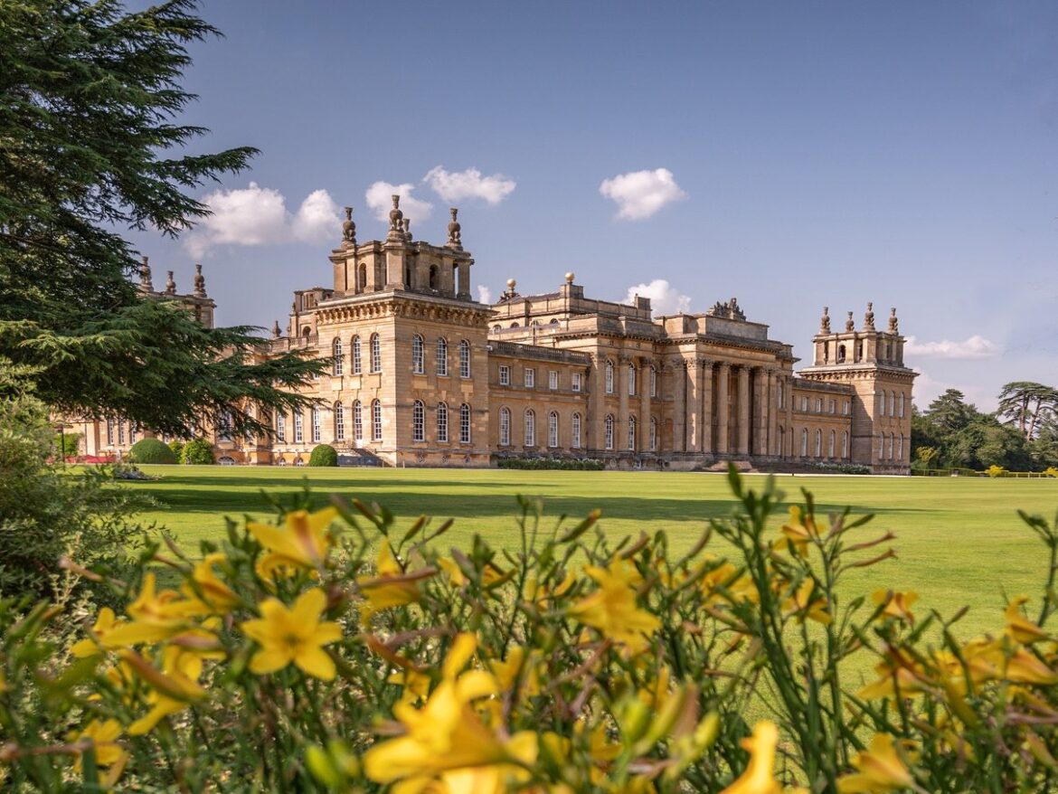 Blenheim Palace seen across the flower-filled South Lawn