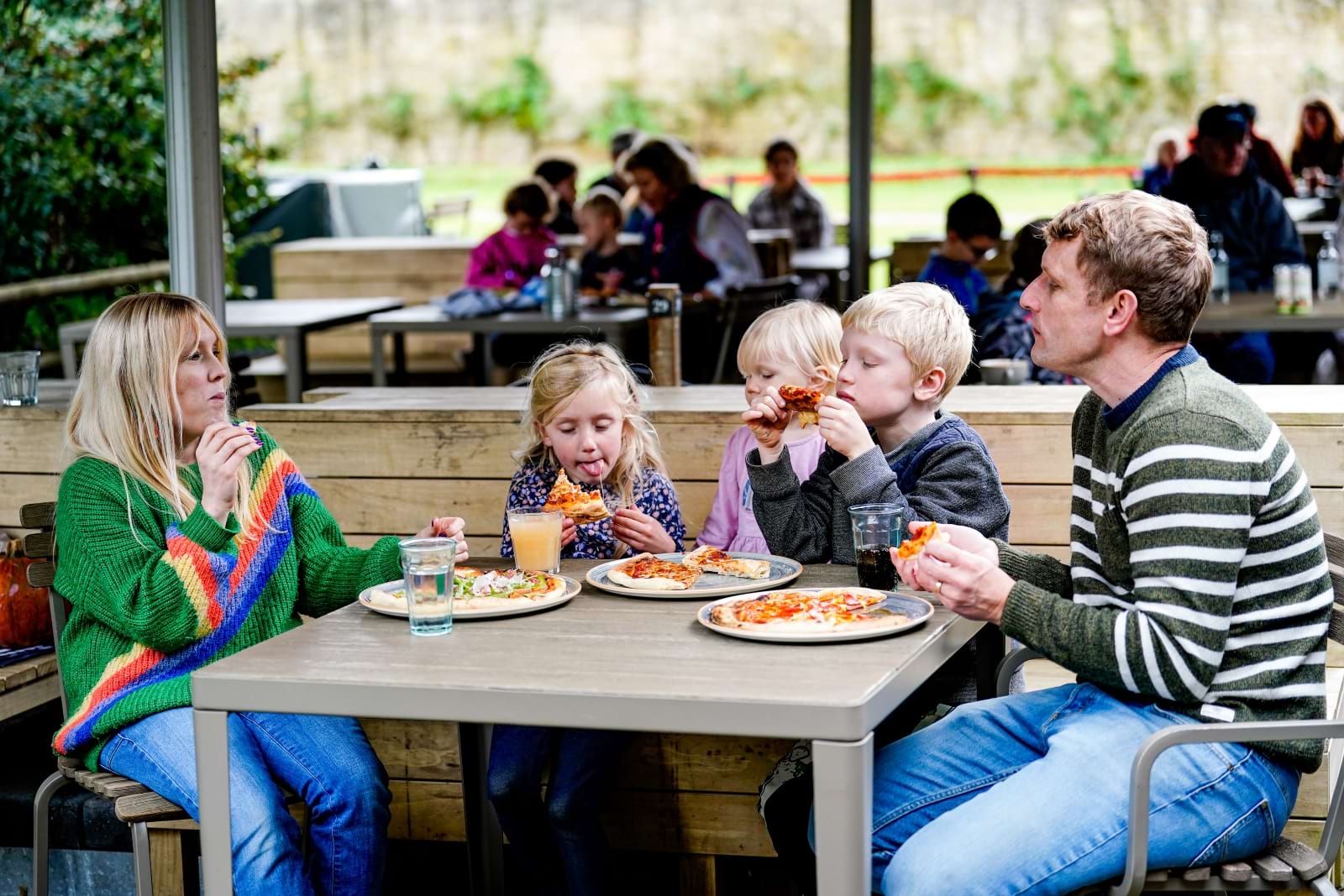 Family eating together in the Walled Garden at Blenheim Palace