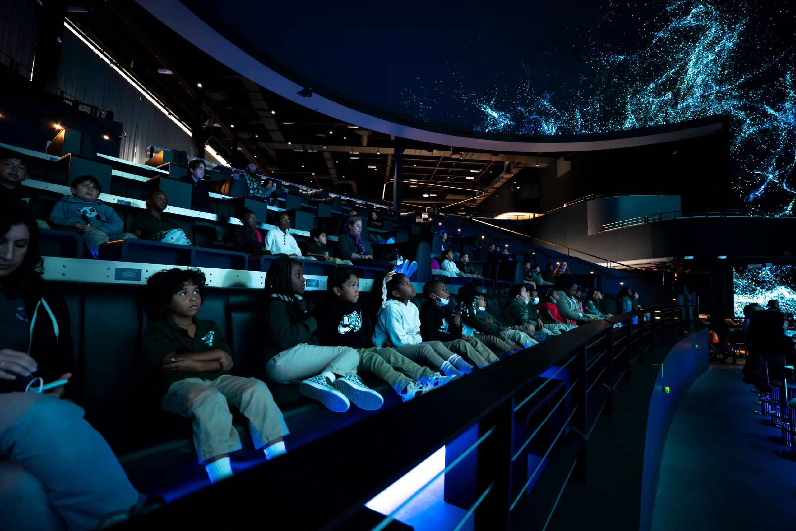 Students experiencing an immersive Cosm field trip