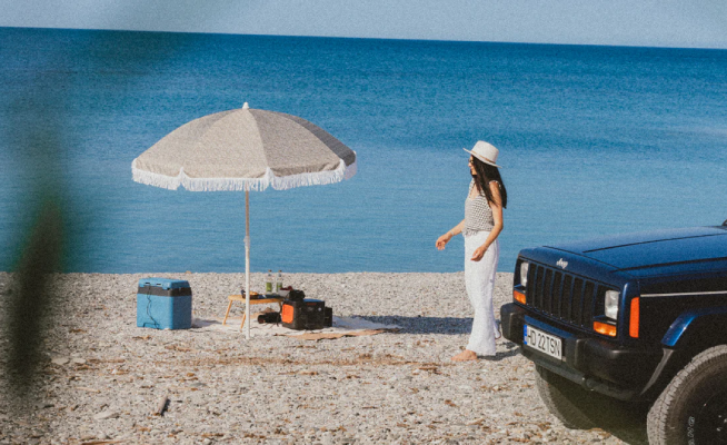 Jackery portable power station used during a beach activity