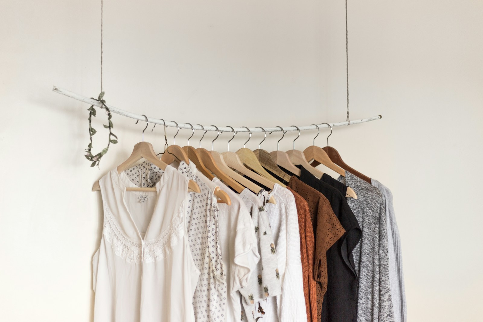 Curated clothing rack with neutral designer-inspired garments