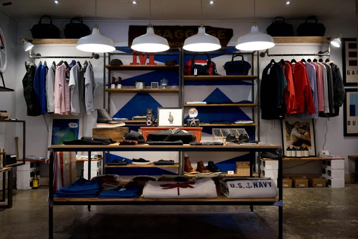 Bright clothing boutique interior with racks and displays