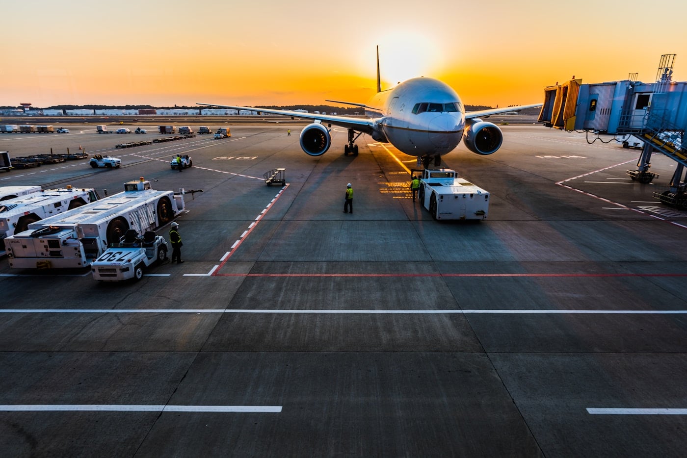 Airplane waiting at an airport gate