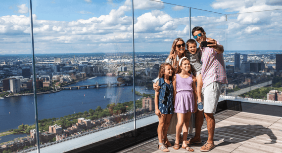 Family enjoying the observation deck at View Boston