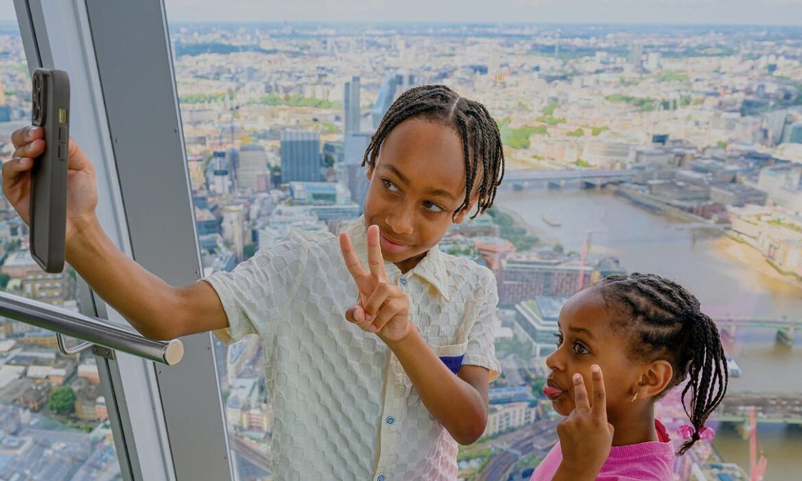 Family enjoying a high-level London view from The Shard
