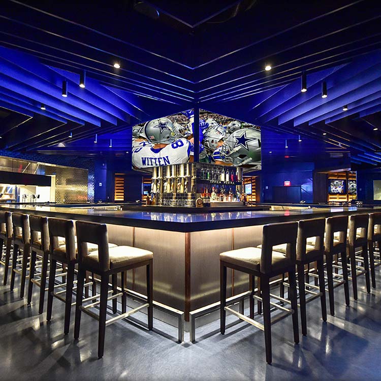 A group enjoying a taste-focused AT&T Stadium tour
