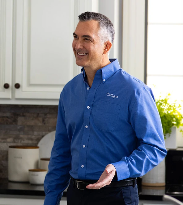 Culligan worker in a kitchen