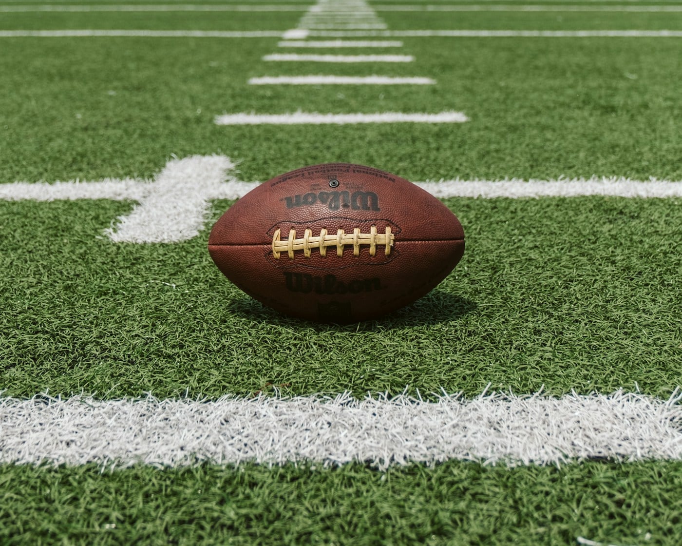 Football stadium under bright lights