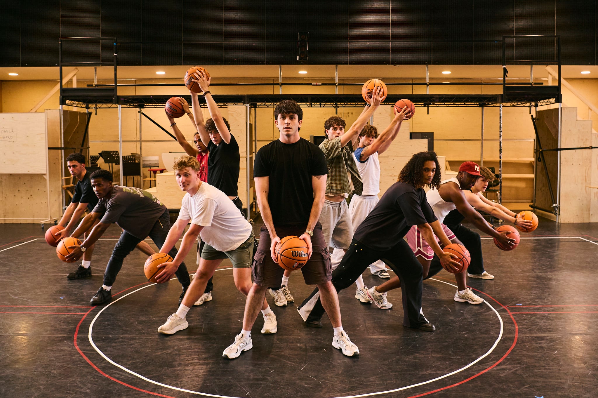 High School Musical cast rehearsing basketball choreography