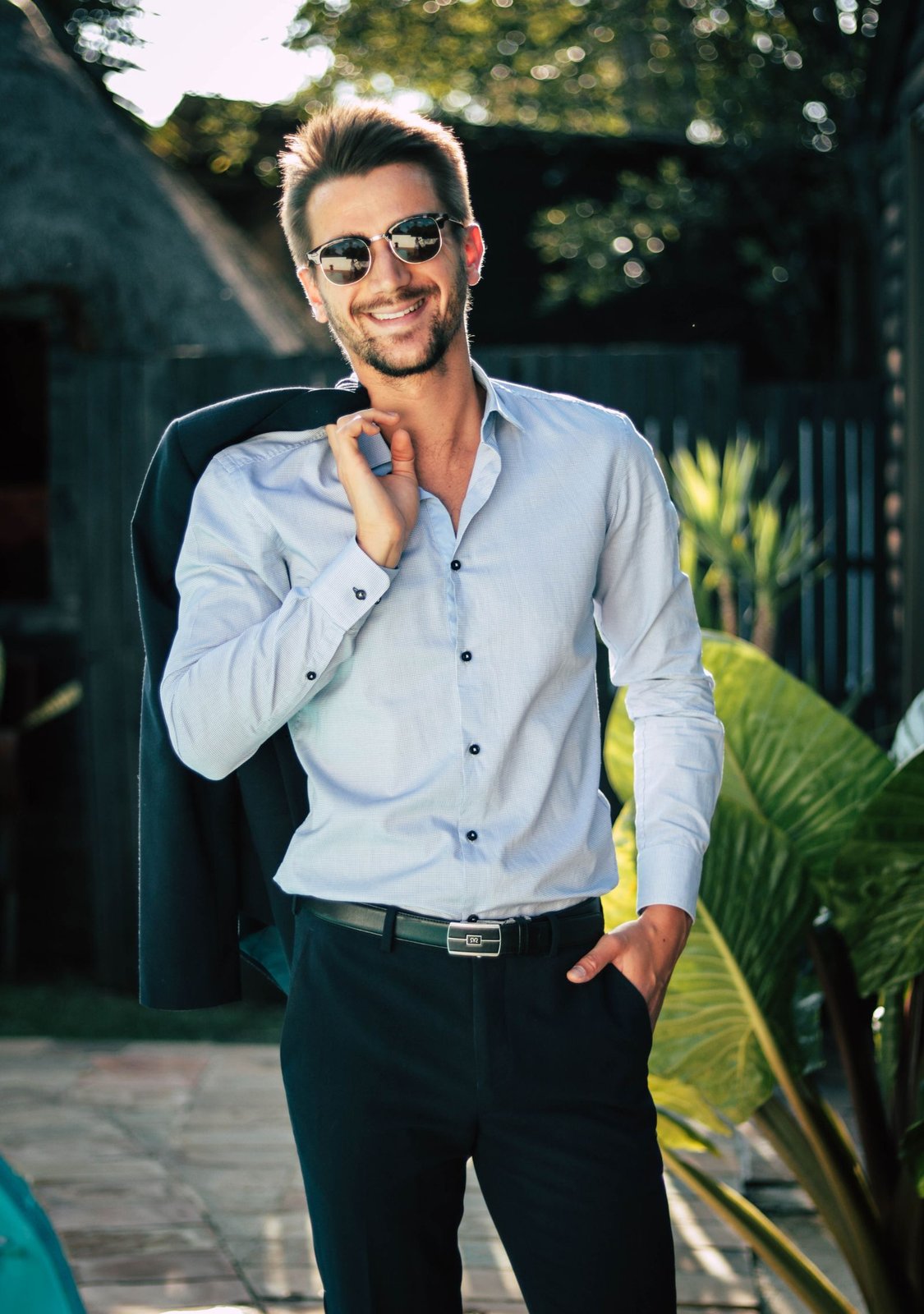 Model presenting a polished fashion outfit