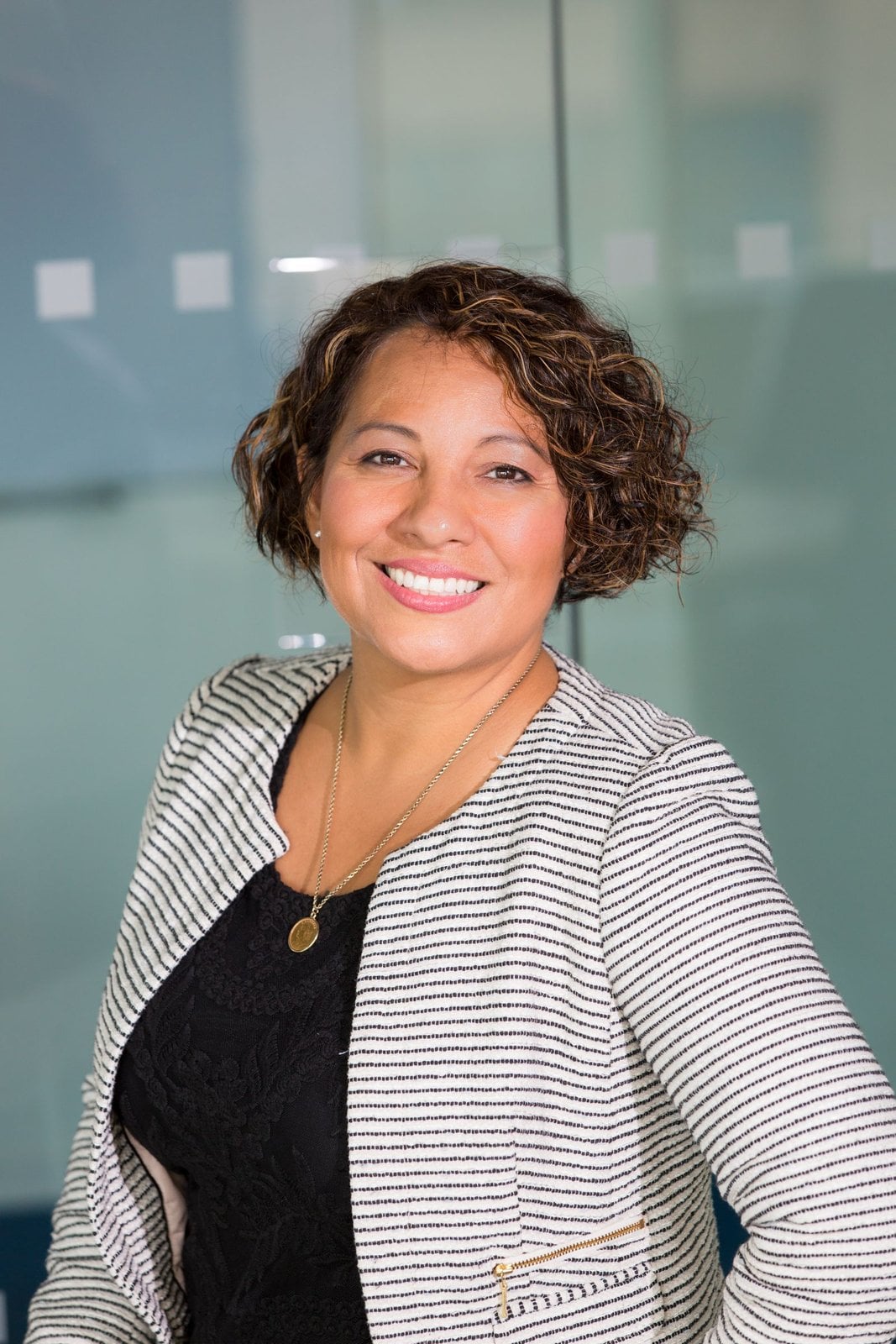 Woman wearing a striped blazer