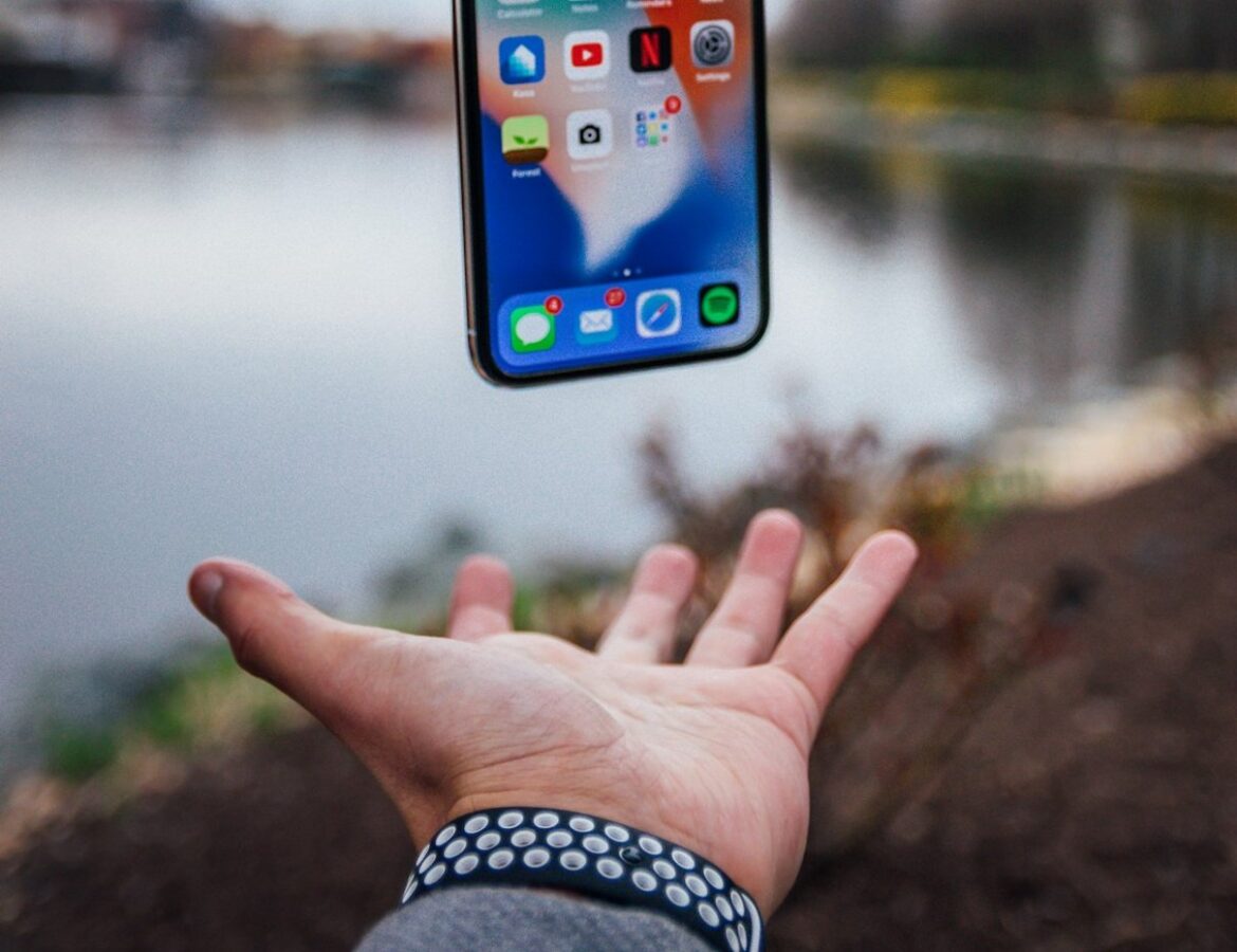 Floating smartphone over a hand