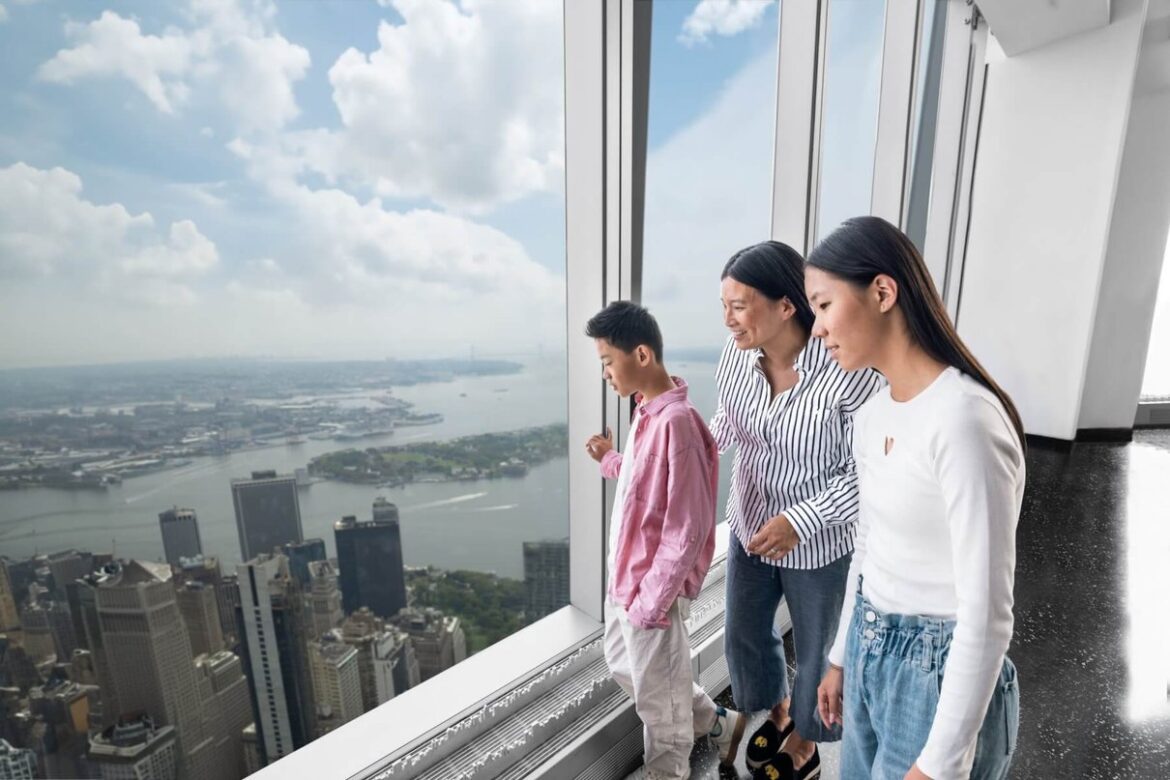 Family taking in the New York skyline from One World Observatory