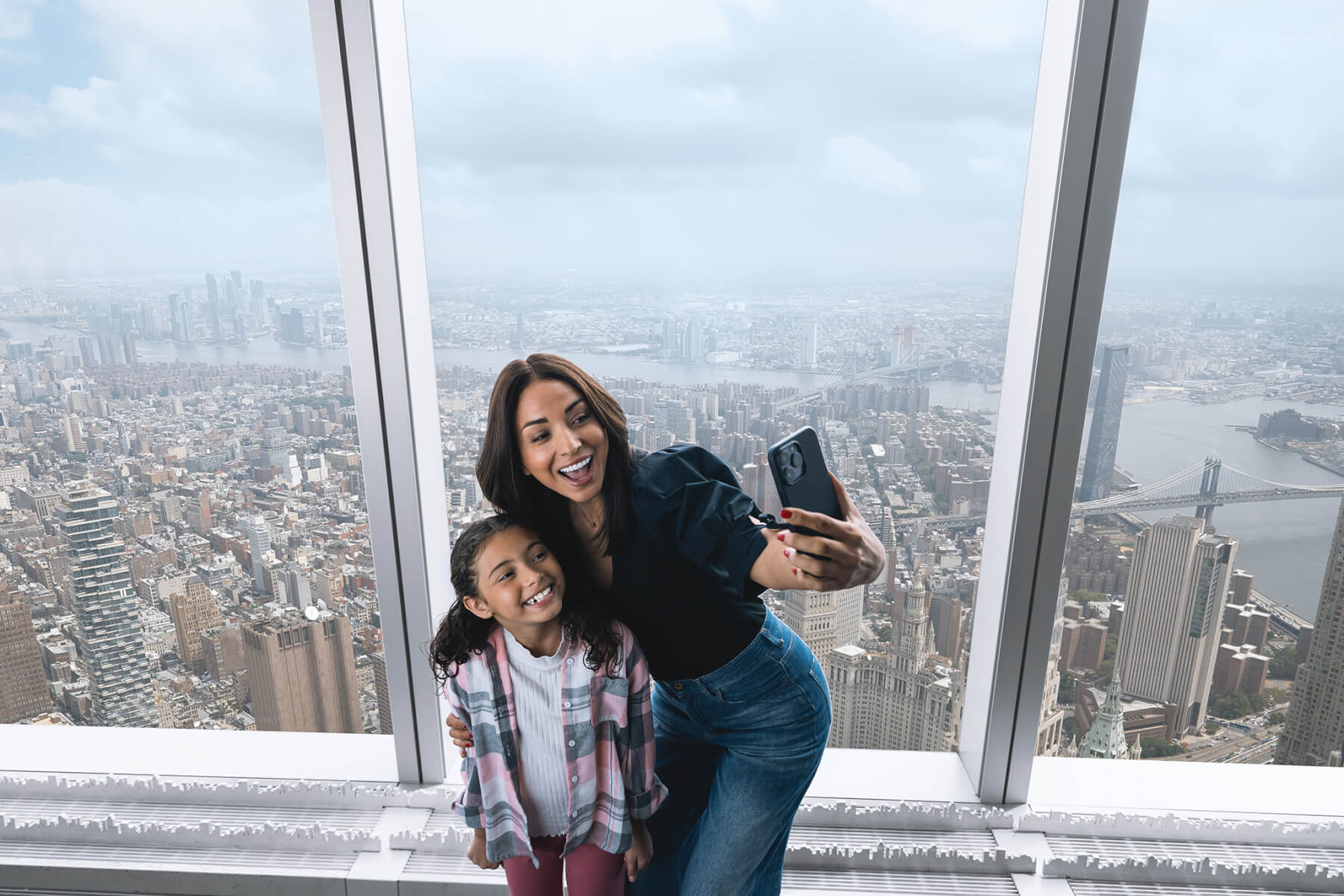 Family enjoying the observation deck view at One World Observatory