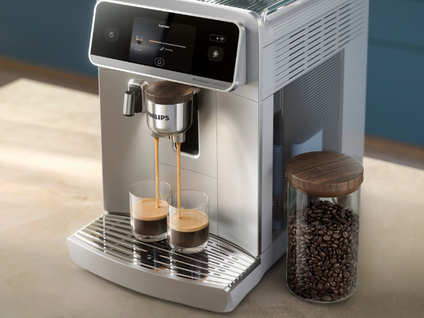 Philips Cafe Aromis 8000 Series machine brewing coffee into cups