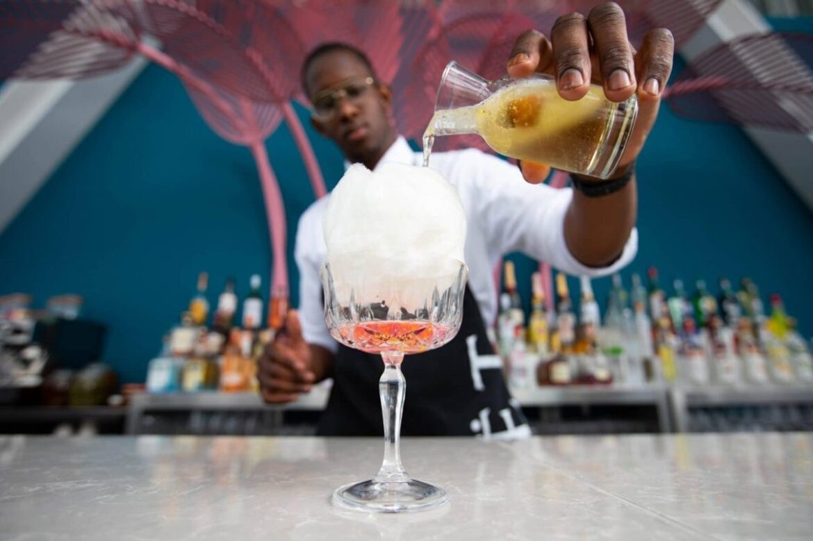 Bartender pouring a smoky cocktail at The View from The Shard