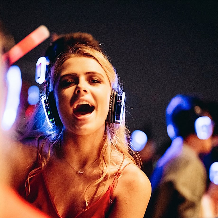 Guests wearing headphones at a Silent Disco inside The View from The Shard