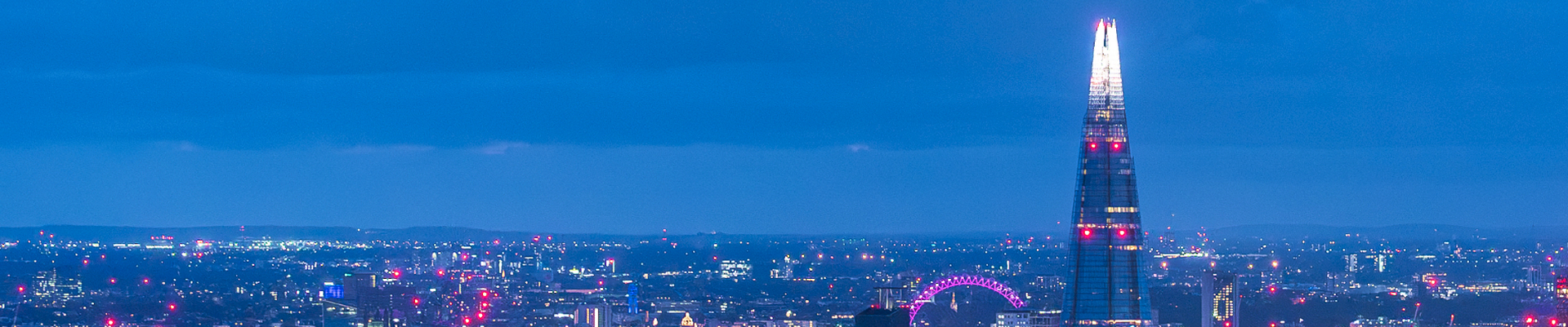Visitors looking across London from The View from The Shard