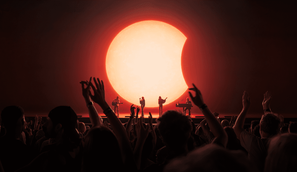 Concert crowd and eclipse screen at ABBA Voyage
