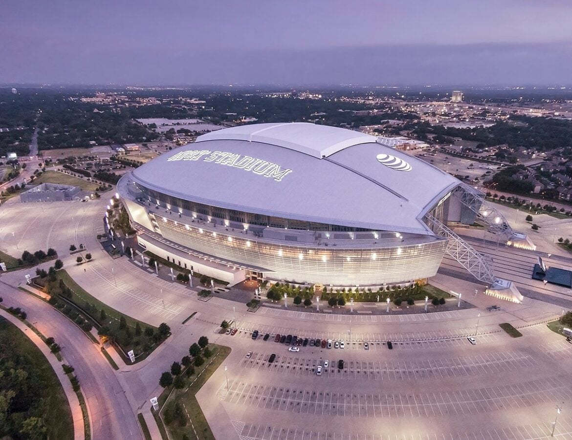 AT&T Stadium illuminated at night