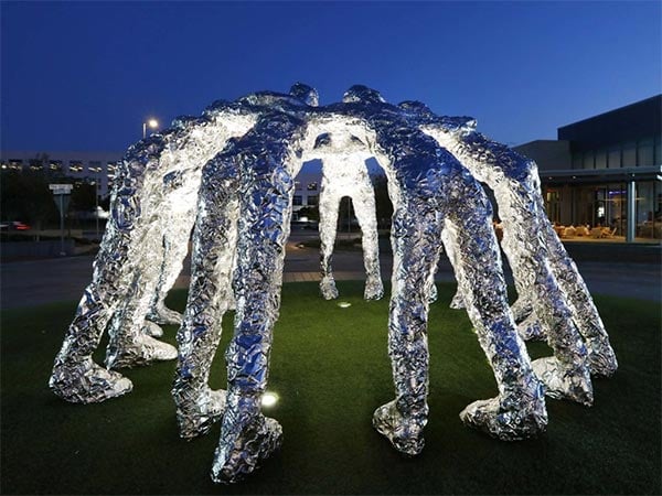 Huddle themed artwork by Friedman inside AT&T Stadium