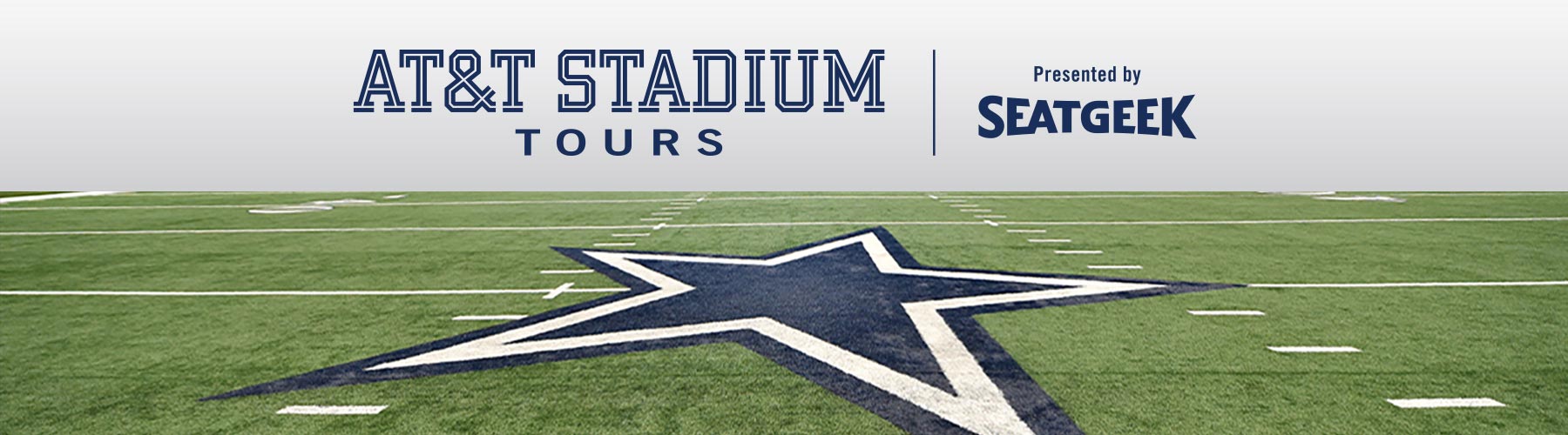A wide interior view from an AT&T Stadium tour