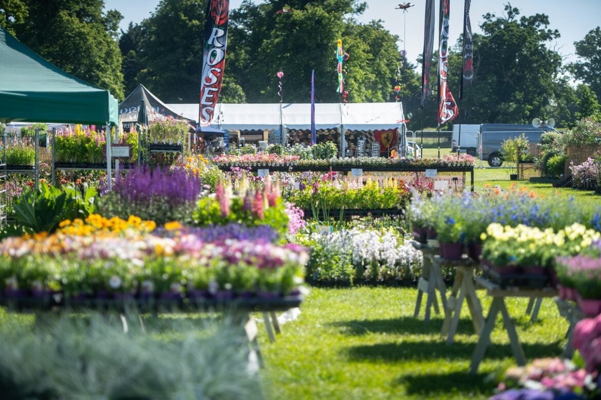Visitors enjoying the flower show at Blenheim Palace