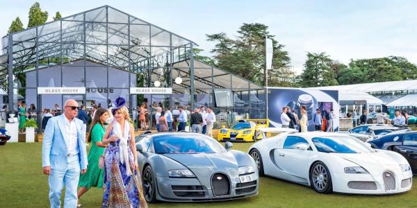 Luxury cars parked outside the glasshouse at Blenheim Palace