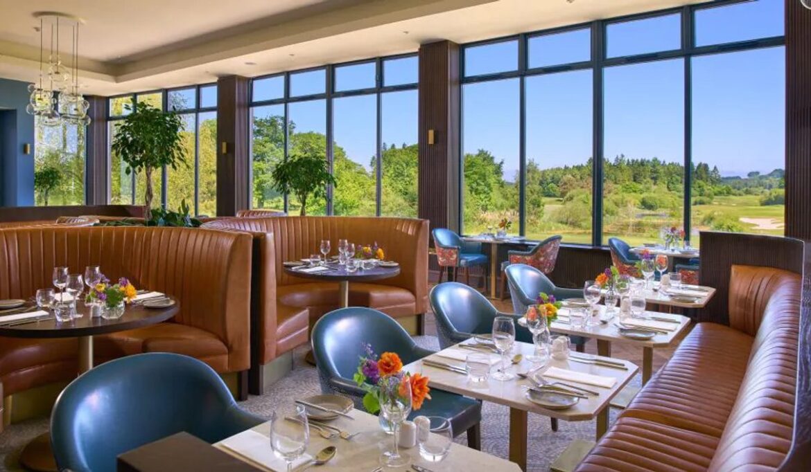 Dining room at Tulfarris Hotel & Golf Resort with views across green grounds