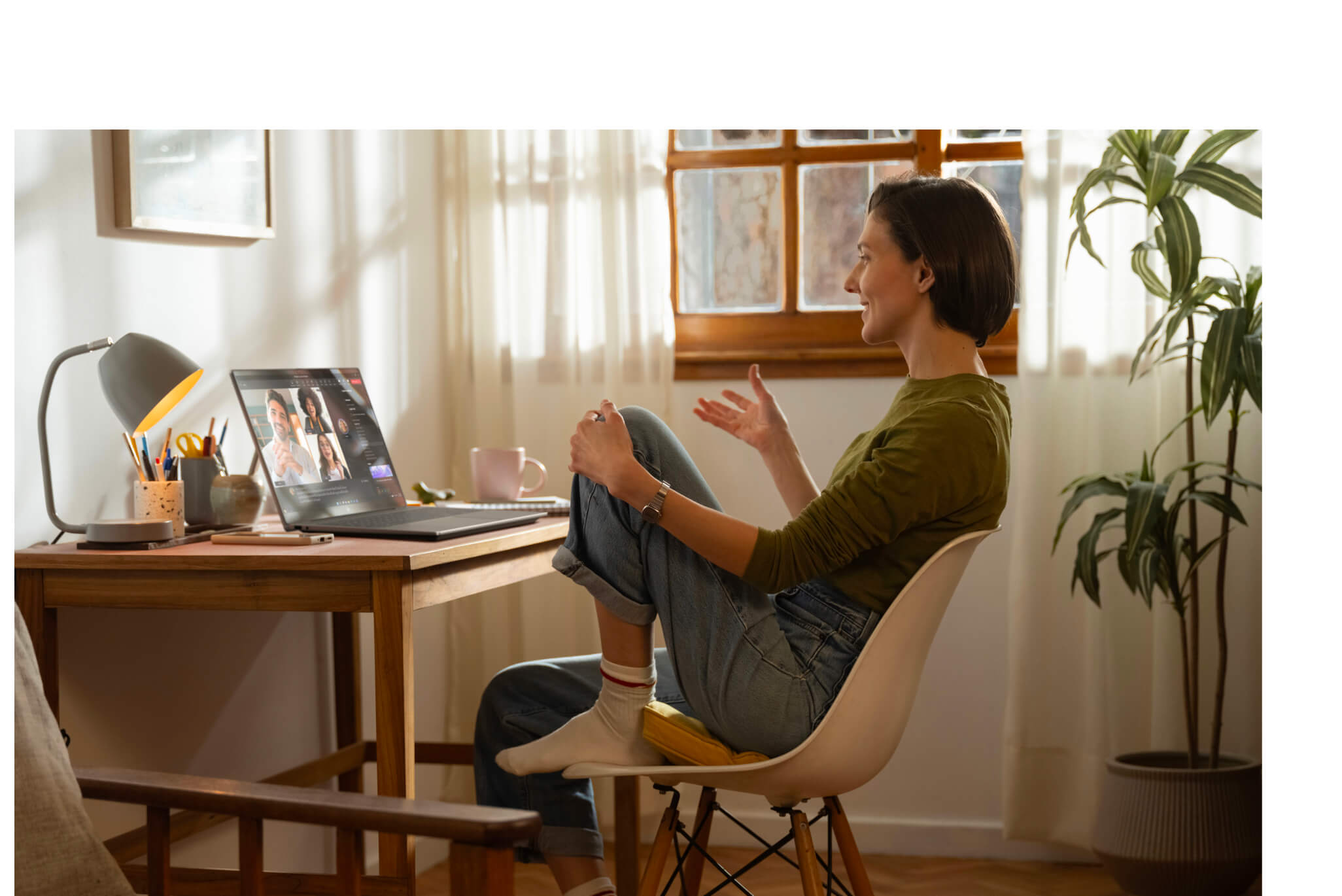 HP laptop shown in a home lifestyle scene