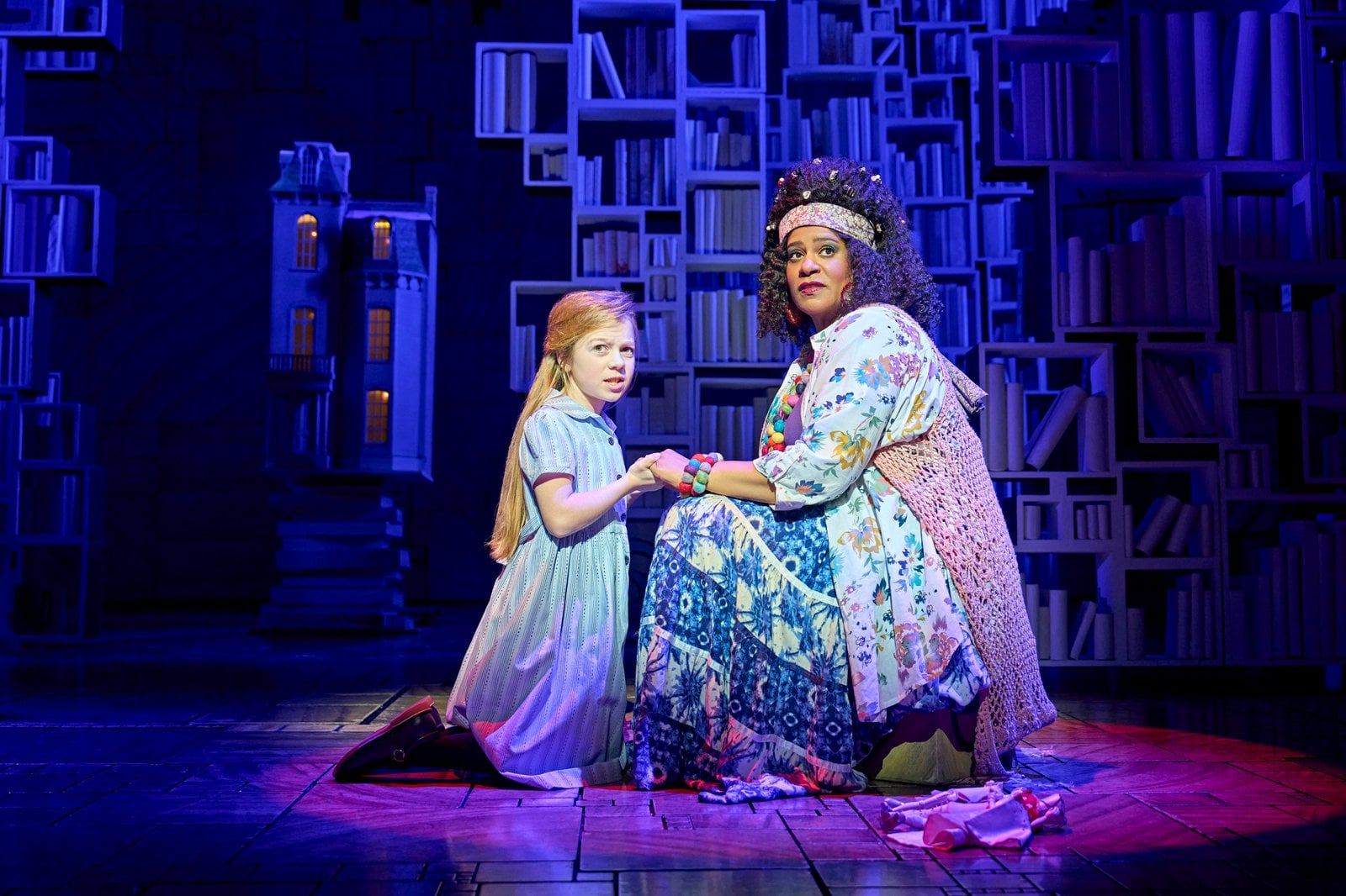 Matilda on stage in a scene from the West End production