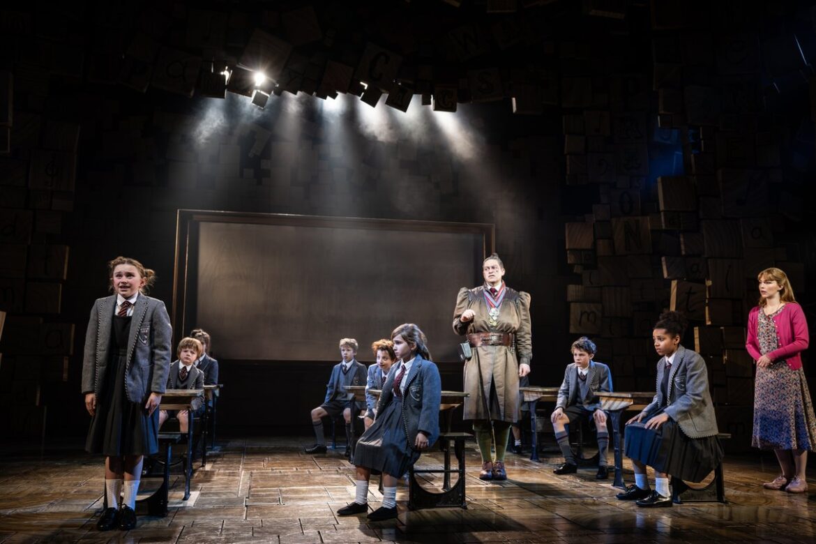 Matilda and classmates in a Cambridge Theatre production scene