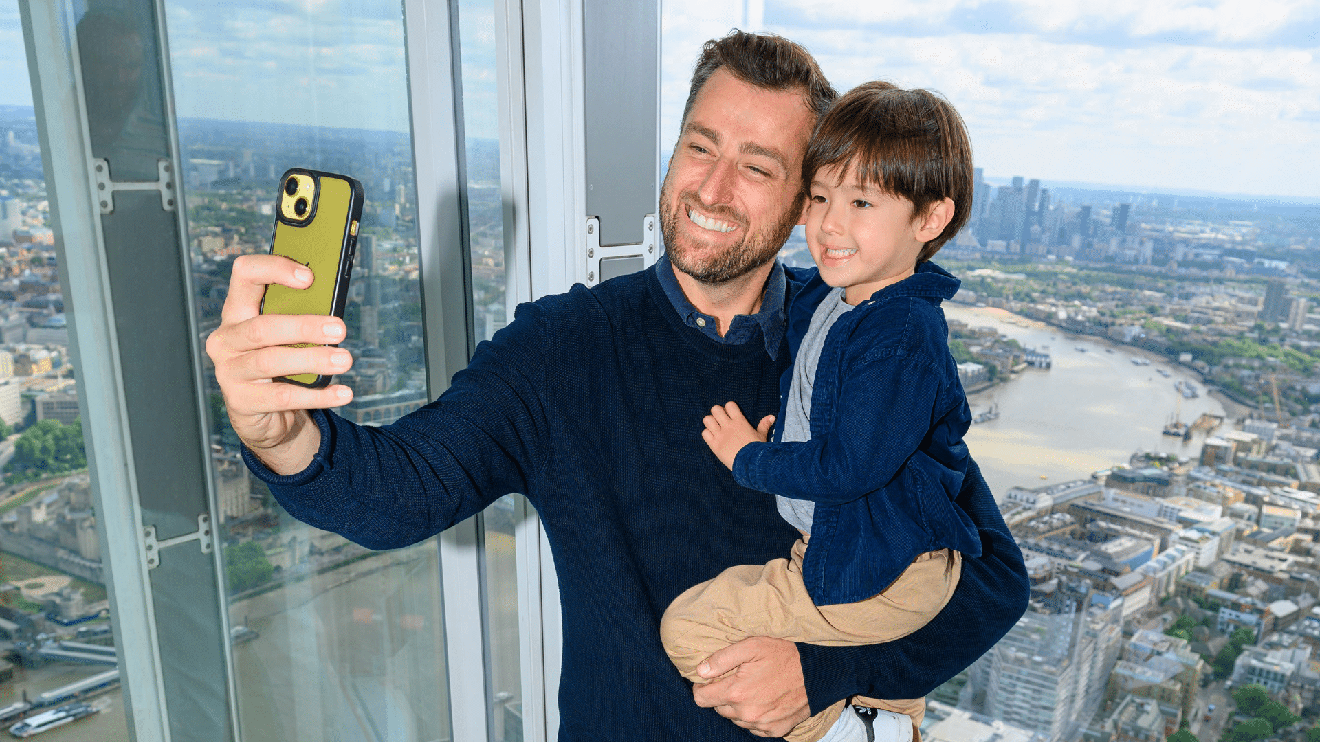 A child enjoying the London view from The View from The Shard