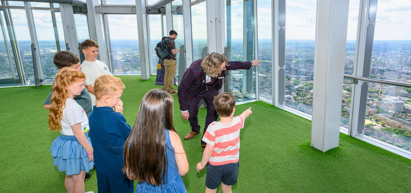 Children looking out over London from The Shard