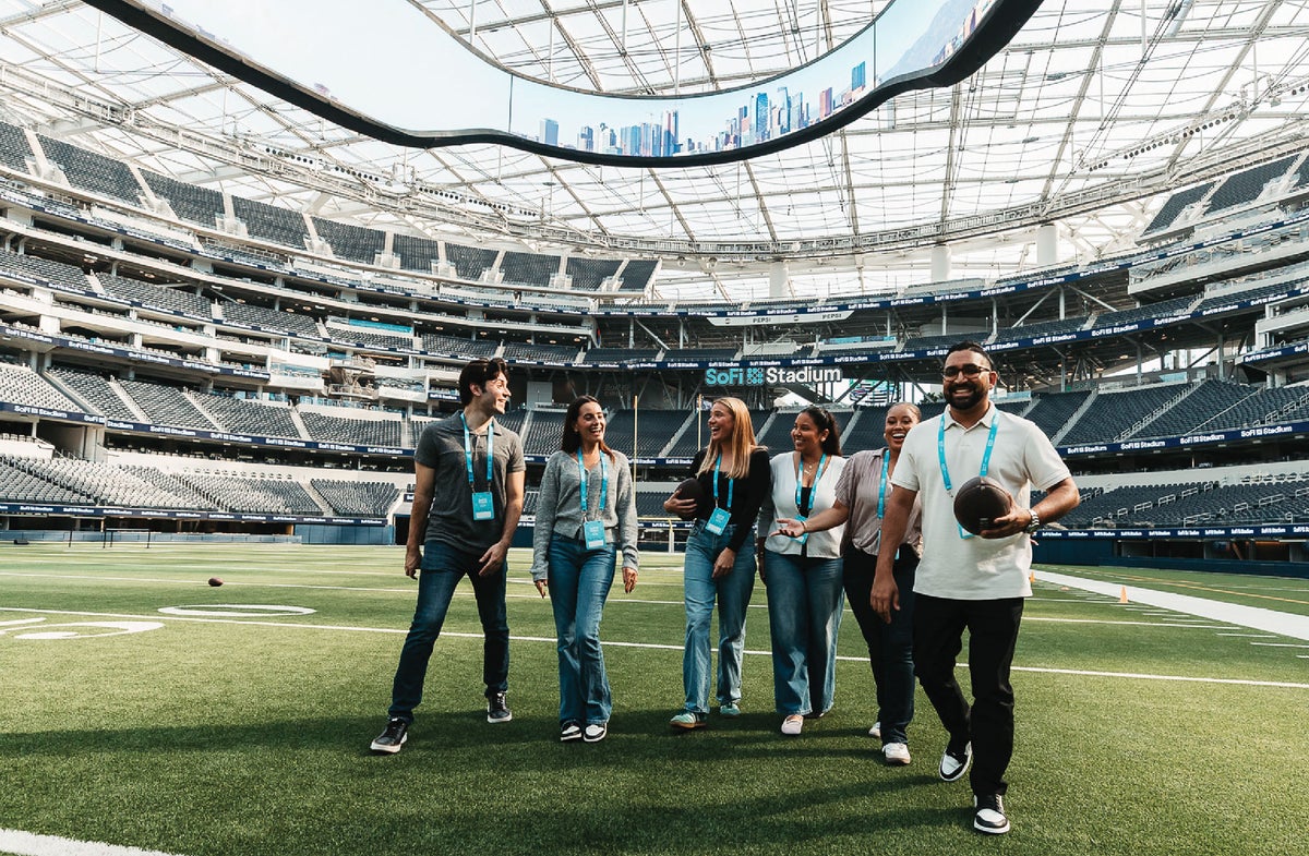 A group tour scene at SoFi Stadium