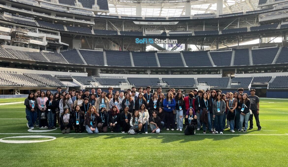 A group visiting SoFi Stadium during a tour