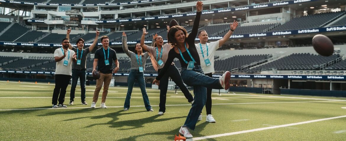 Visitors on the SoFi Stadium field during a stadium tour