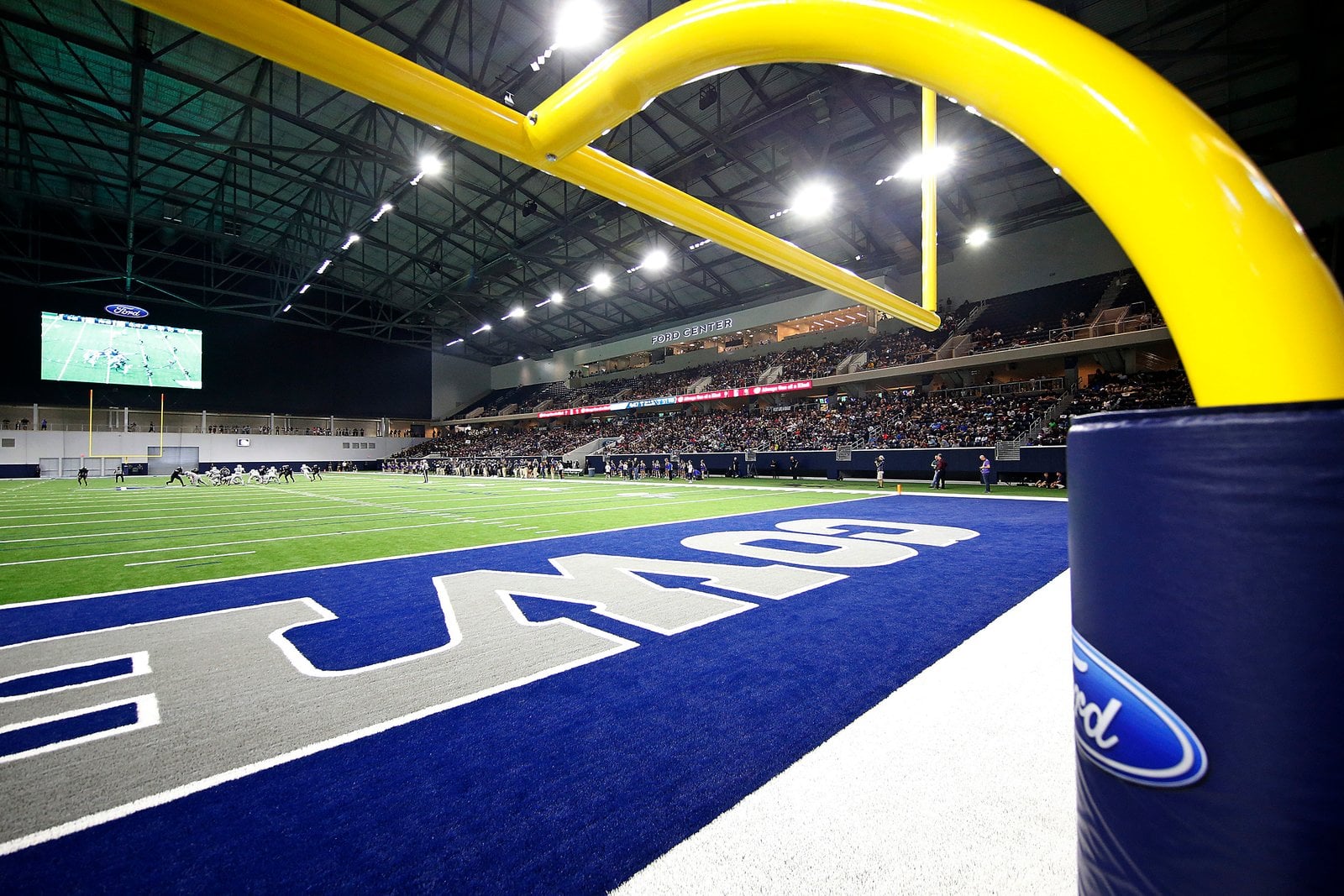 Football activity on the Ford Center field