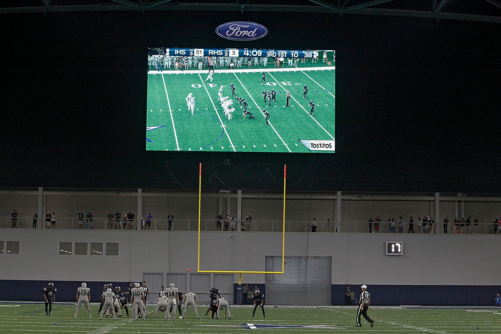 Large video board inside the Dallas Cowboys facility