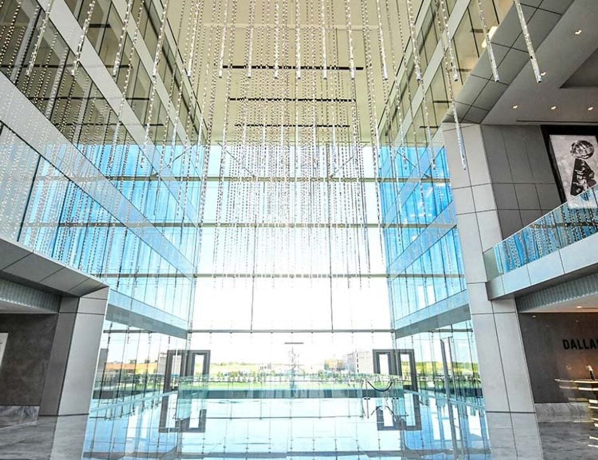 Modern glass atrium lobby at The Star in Frisco