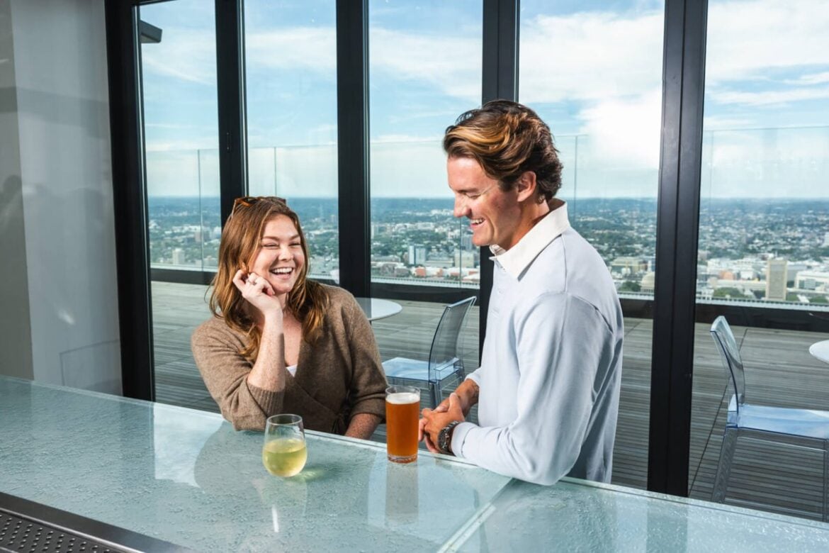Visitors taking in the Boston skyline at View Boston Observation Deck
