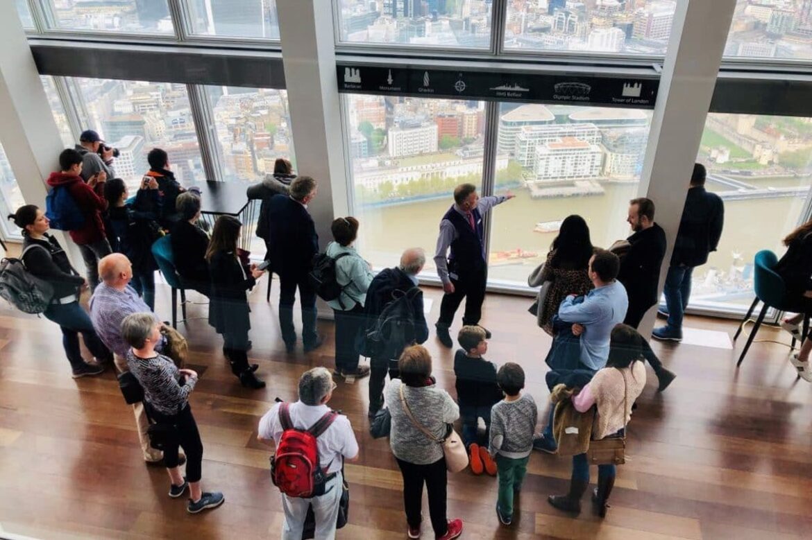 Visitors taking in the London skyline together at The View from The Shard